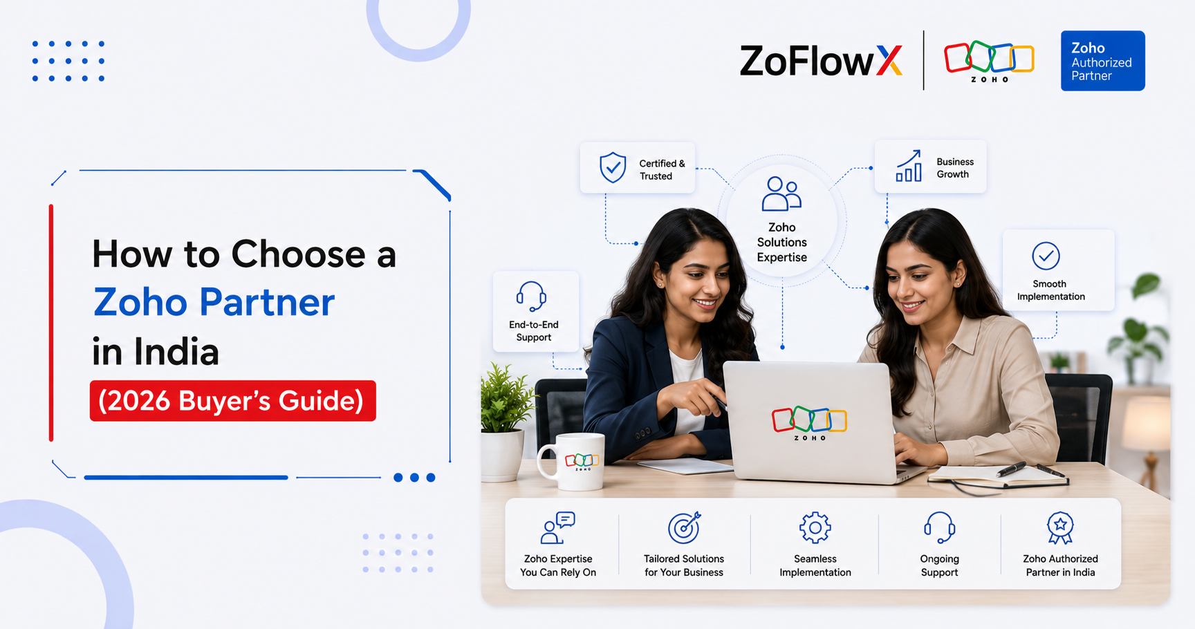 Business owner and Zoho consultant in India reviewing apps together on a laptop